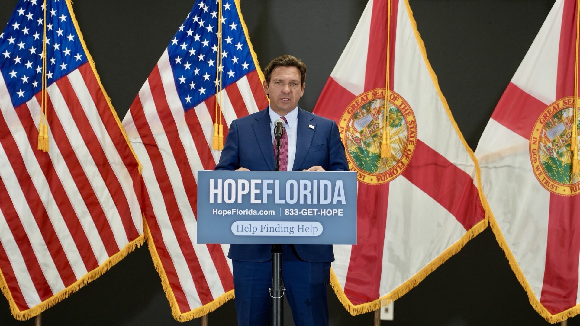 Governor Ron DeSantis speaking at a Hope Florida event in Lake County, Florida