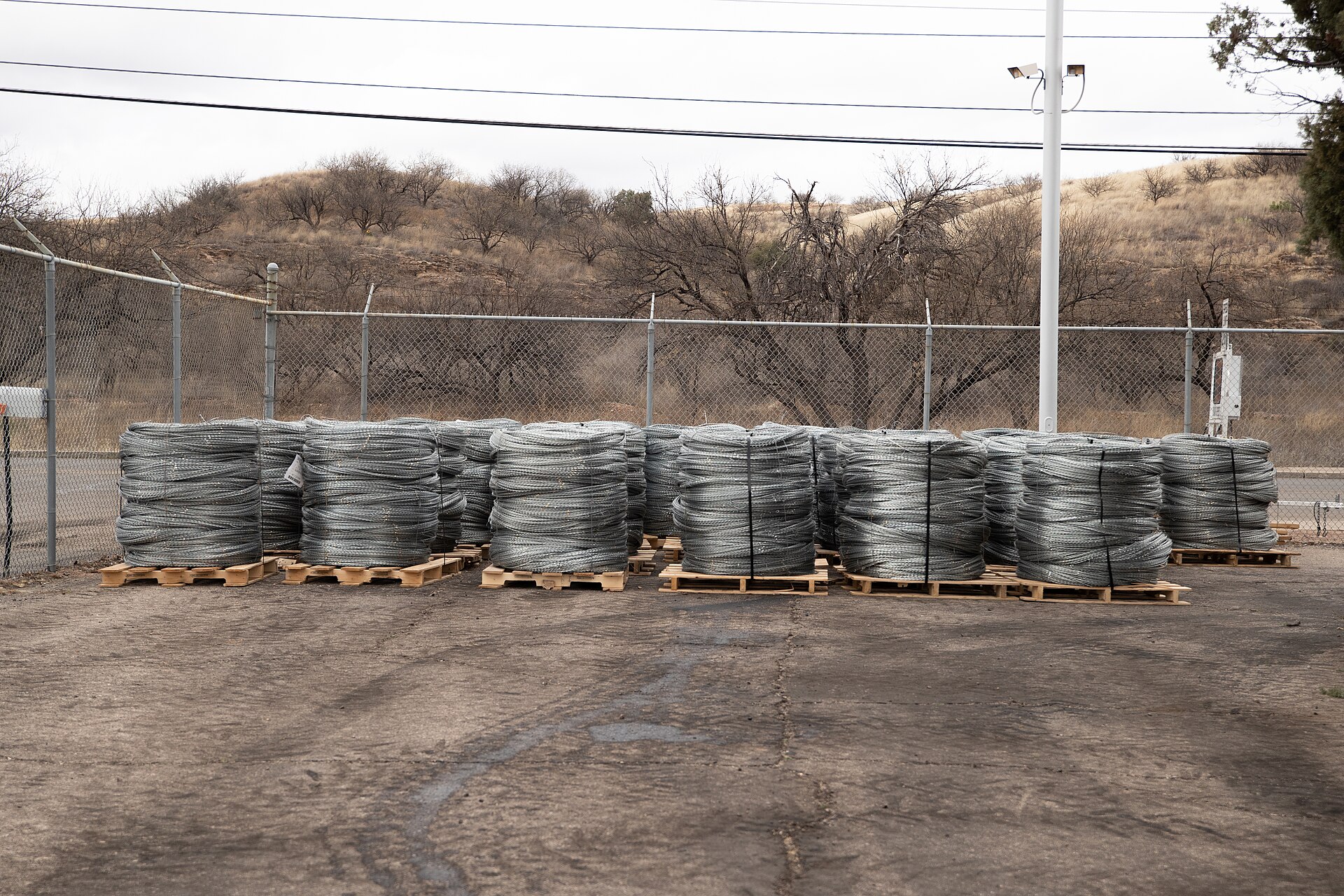 Layers of Concertina are added to existing barrier infrastructure along the U.S. Mexico border