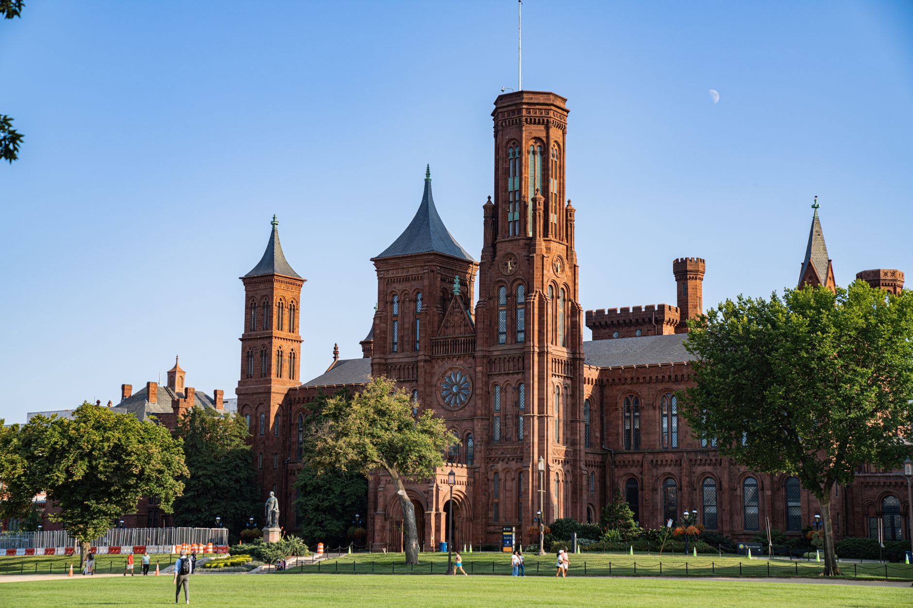 The iconic Smithsonian Institution Building, also known as The Castle, in Washington DC on a sunny day.